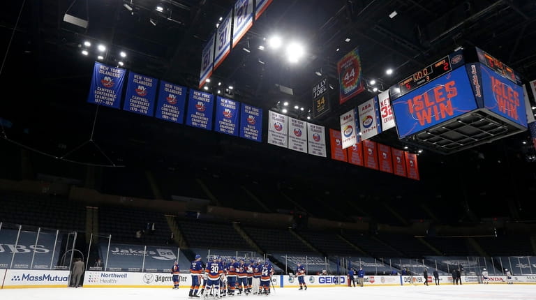 The New York Islanders celebrate on March 7 after defeating...