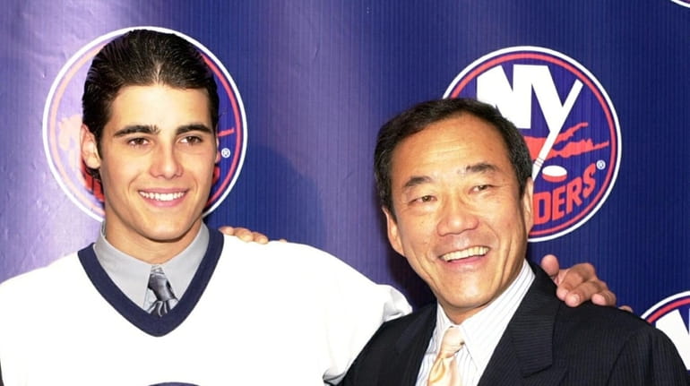 Islanders first-round draft pick Rick DiPietro and team co-owner Charles...