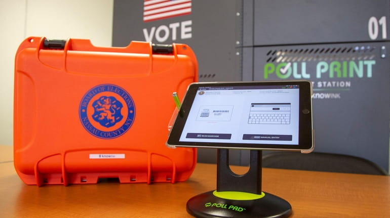 An iPad, which will be used for early voting, is...