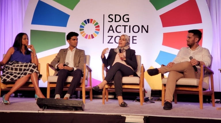 Saad Amer, second from left, participates in a group panel...