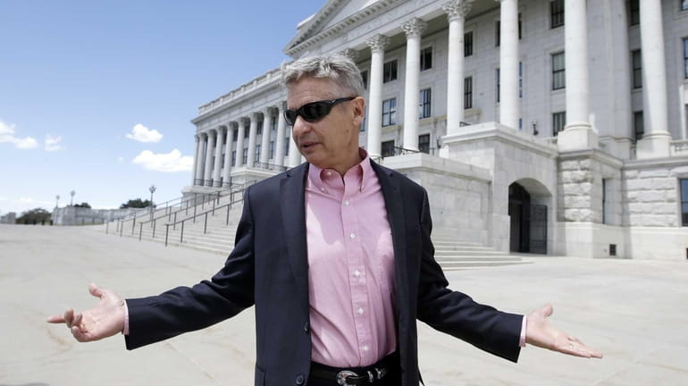 Libertarian candidate and former New Mexico Gov. Gary Johnson leaves...