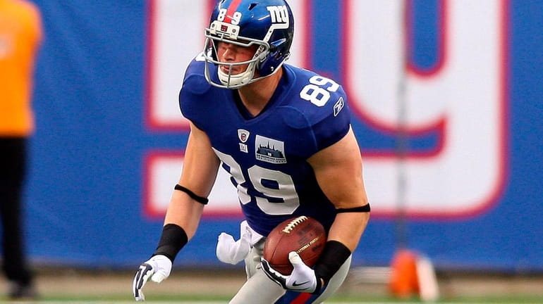Giants tight end Kevin Boss will work out Tuesday for...