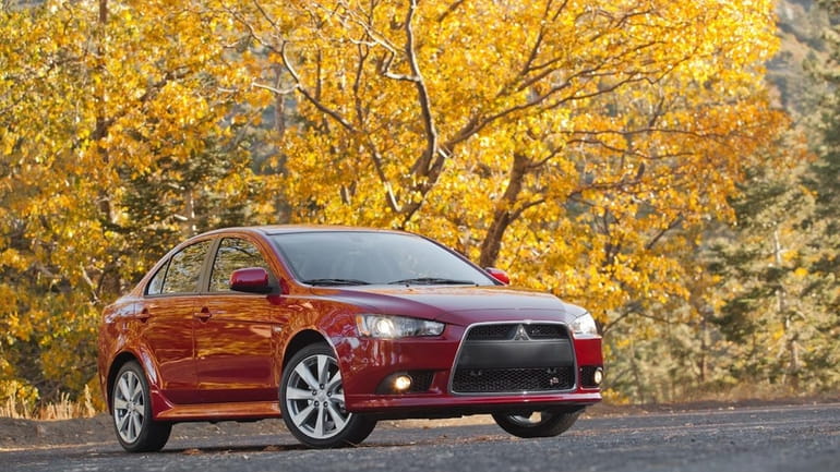 The 2013 Mitsubishi Lancer GT is pictured.