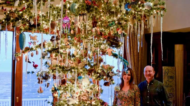 Toniann and Jim Bartscherer with their upside down Christmas tree...