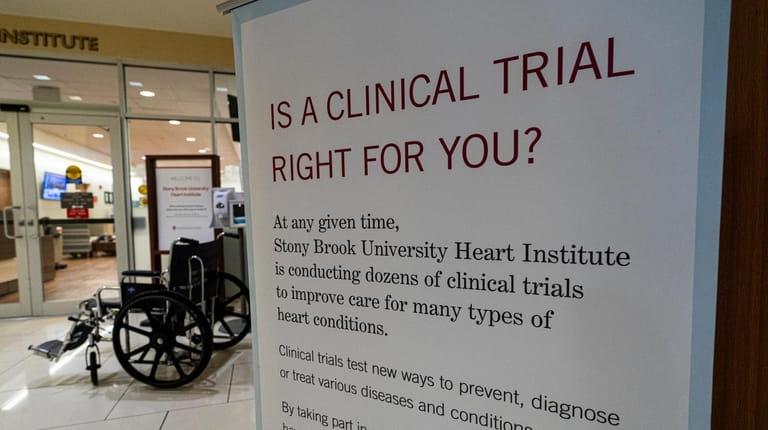A sign promotes participation in clinical trials at Stony Brook...