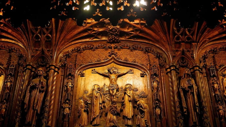 A detail of the hand-carved, wooden Stations of the Cross...