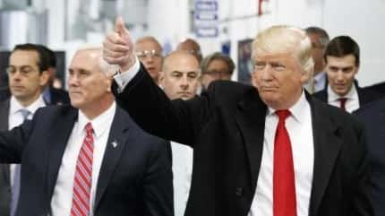 President-elect Donald Trump and Vice President-elect Mike Pence wave as...