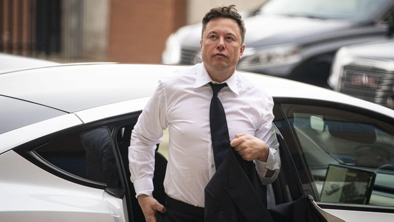 Elon Musk, chief executive officer of Tesla Inc., arrives at...