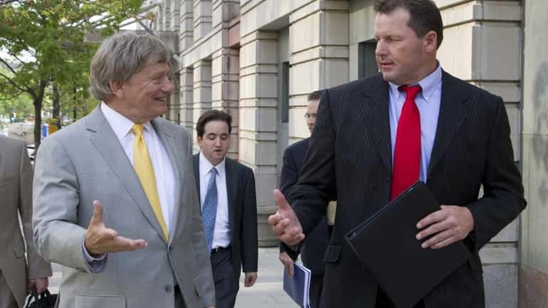 Former Major League Baseball pitcher Roger Clemens and his lawyer...