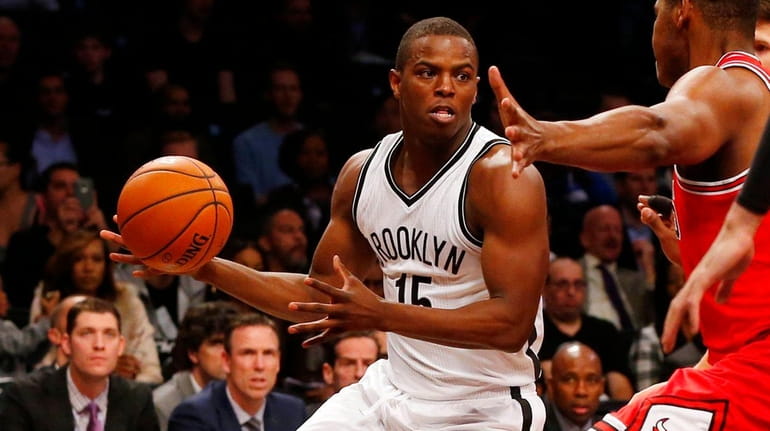 Isaiah Whitehead of the Brooklyn Nets controls the ball in...