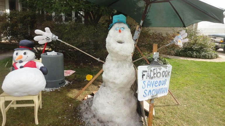 Despite four consecutive days of 60-degree weather, the snowman that...