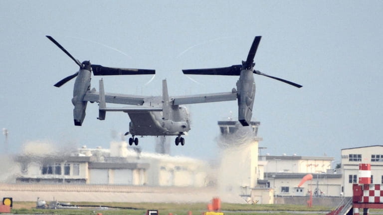 A U.S. military CV-22 Osprey takes off from Iwakuni base,...