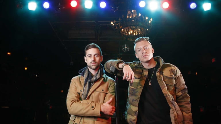 Ben Haggerty, better known by his stage name Macklemore, right,...