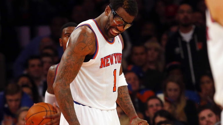 Amar'e Stoudemire of the Knicks reacts after losing the ball...