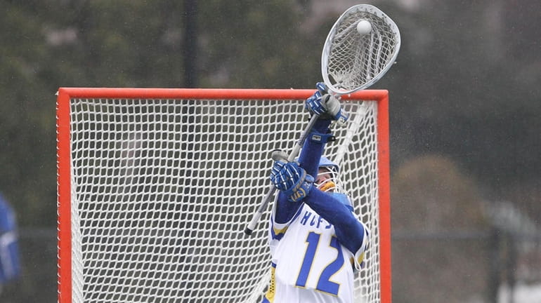 Hofstra's Jack Concannon (12) makes a save in the third...