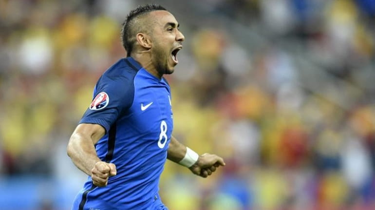 France's Dimitri Payet celebrates after scoring his side's second goal...