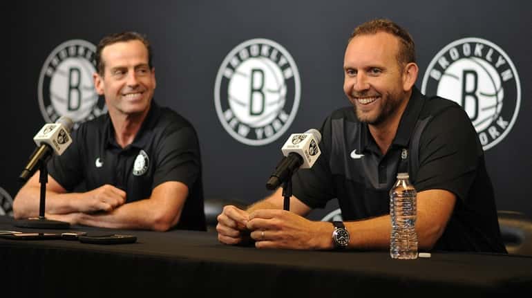 Brooklyn Nets Coach Kenny Atkinson General Manager Sean Marks. right,...