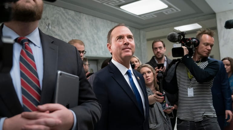 House Intelligence Committee Chairman Adam Schiff, D-Calif., rushes to a vote...