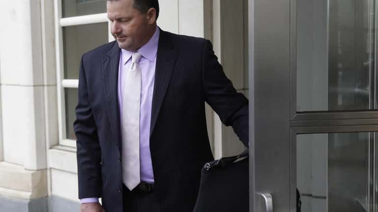 Roger Clemens arrives at federal court in New York on...