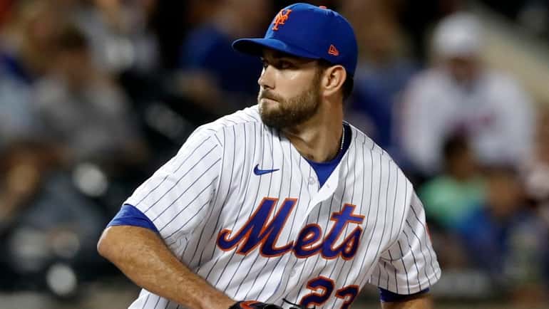 David Peterson of the Mets pitches during the seventh inning...