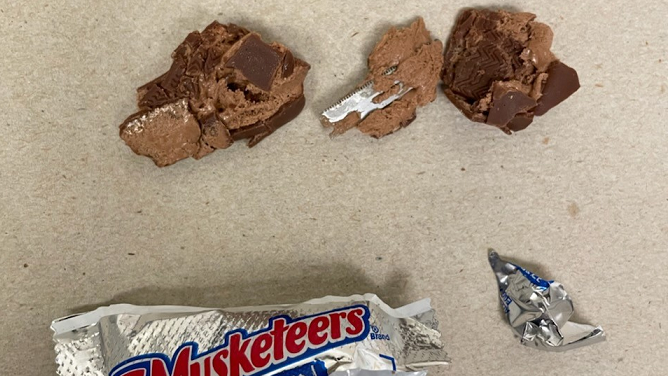 A razorblade in a 3 Musketeers candy bar Suffolk Police...
