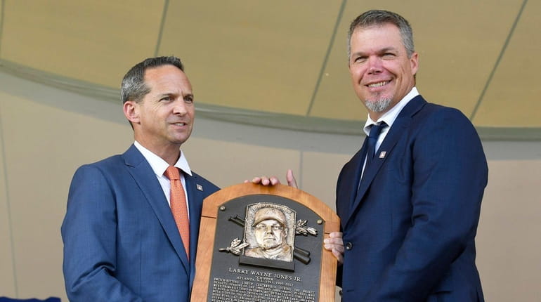Hall of Fame President Jeff Idelson poses with Chipper Jones...