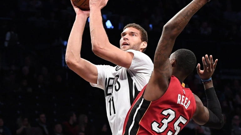 Nets center Brook Lopez, who had 30 points and eight...