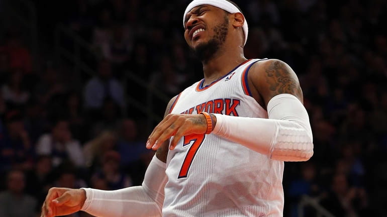 Carmelo Anthony reacts after a play against the Nets at...