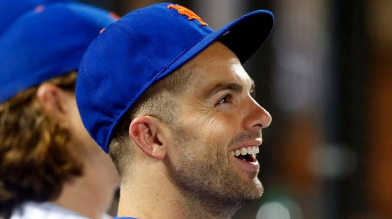 David Wright of the New York Mets looks on from...