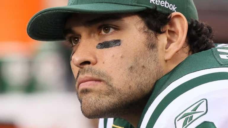 Mark Sanchez of the Jets looks on in the fourth...