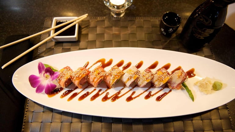 The elegant presentation of the 'out-of-control roll', an excellent sushi...