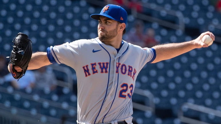Mets starting pitcher David Peterson pitches in the first inning...
