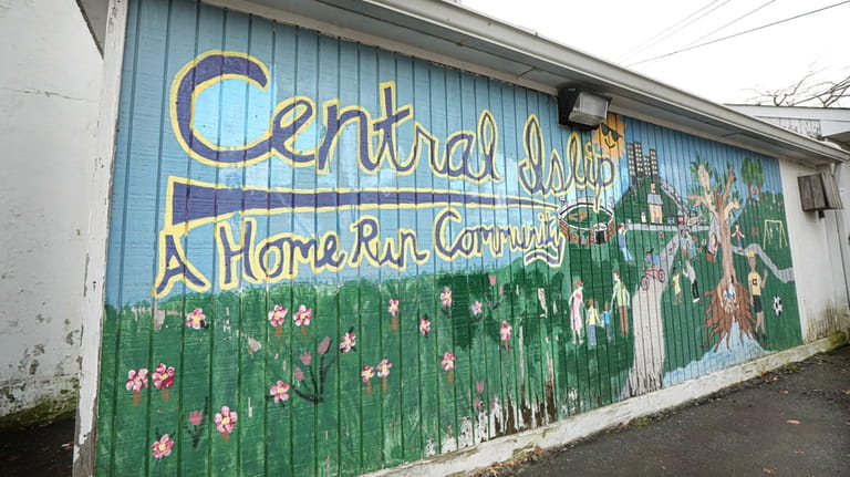A mural on Carleton Avenue reflects community pride.