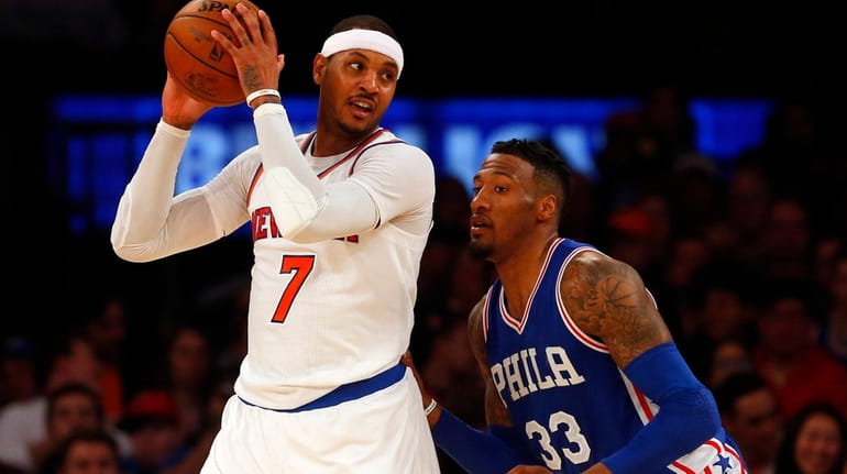 Carmelo Anthony #7 of the New York Knicks controls the...