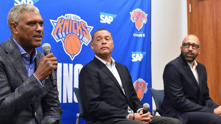Steve Mills, Knicks president, left, speaks alongside general manager Scott...