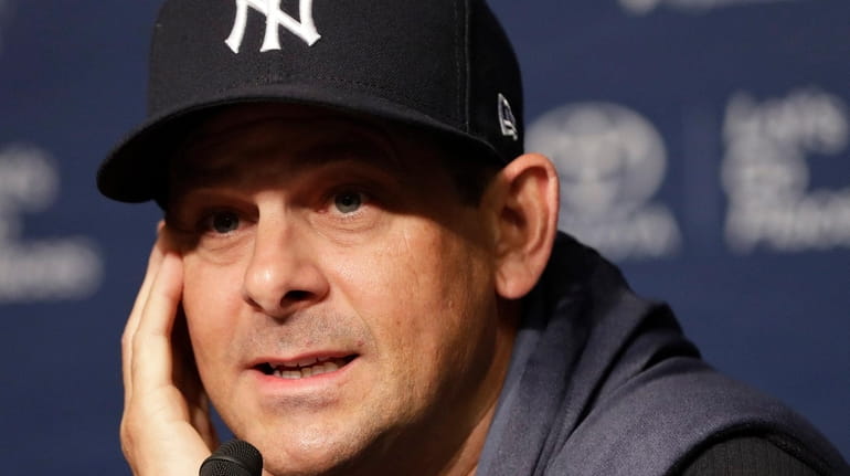 Yankees manager Aaron Boone speaks during a news conference Wednesday...