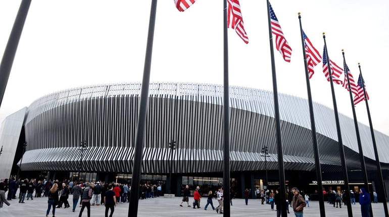 Fans file into NYCB Live's Nassau Coliseum for a concert...
