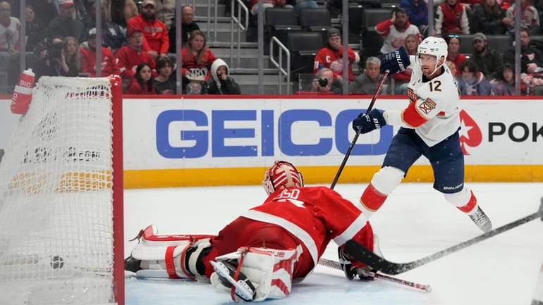 Florida Panthers center Eric Staal (12) shoots the puck past...