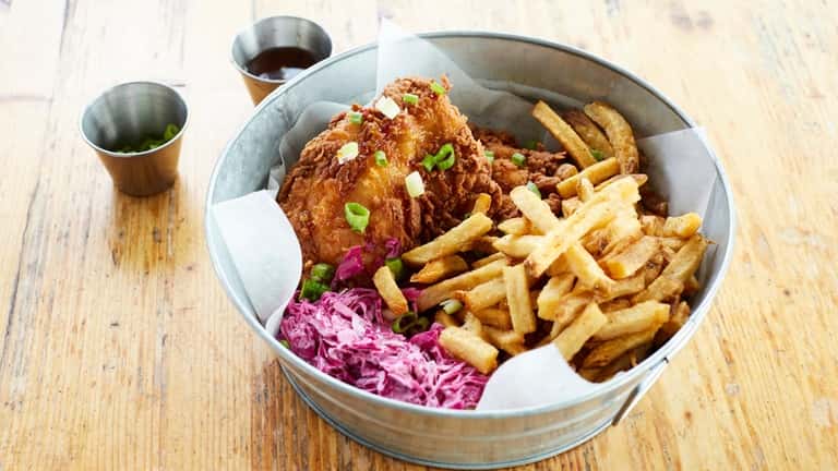 Buttermilk fried chicken with lime chili sauce, jicama-cabbage slaw and...