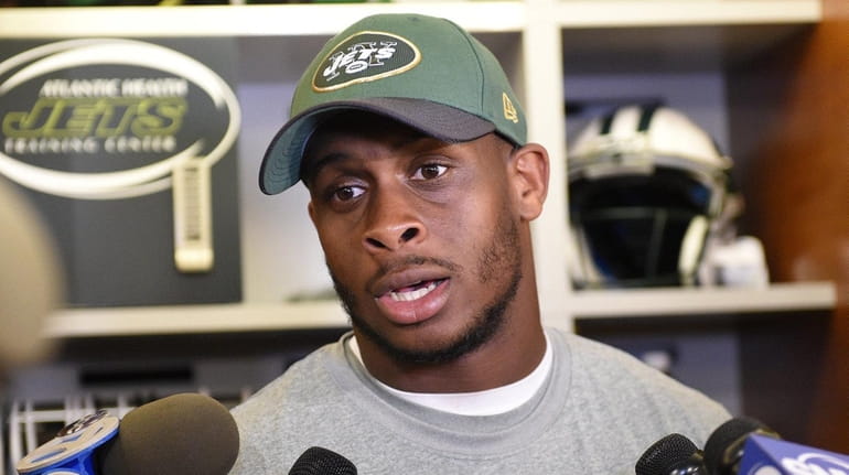 New York Jets quarterback Geno Smith answers questions from the...