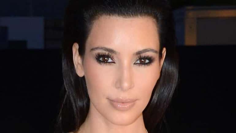 Kim Kardashian arrives at Cruel Summer, Kanye West’s art film...