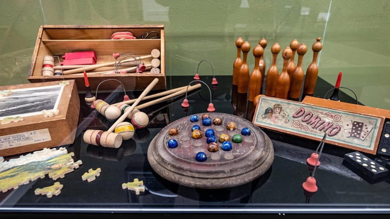 Wooden toys on display at the "Inventing Childhood" exhibit at...