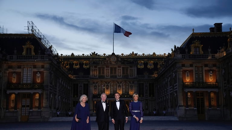 French President Emmanuel Macron, center right, his wife Brigitte Macron,...