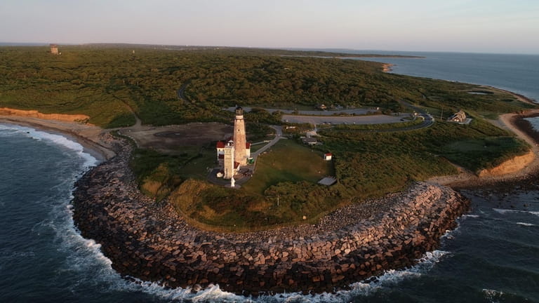The lighthouse, seen here in June, once stood about 297 feet...