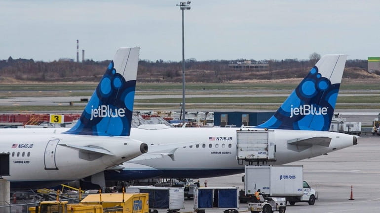 JetBlue flights are seen at John F. Kennedy International Airport...