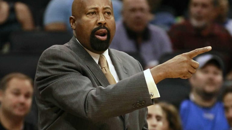 Mike Woodson directs his team during a game against the...