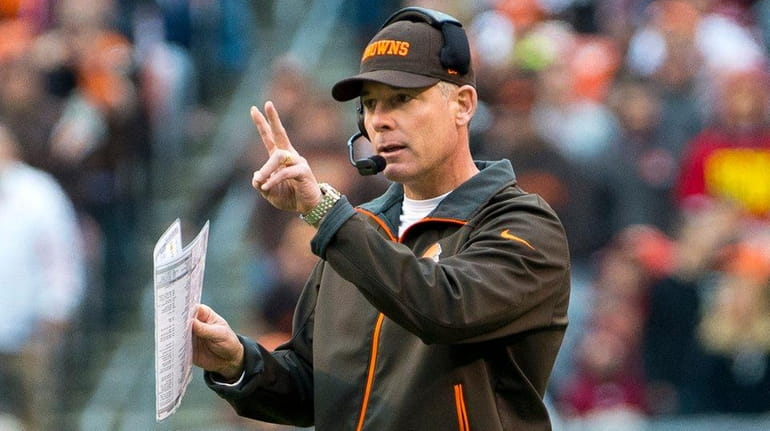 Head coach Pat Shurmur of the Cleveland Browns signals to...