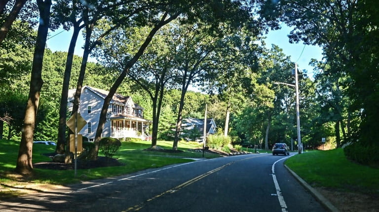 Homes along Crystal Brook Hollow Road in Port Jefferson Station.