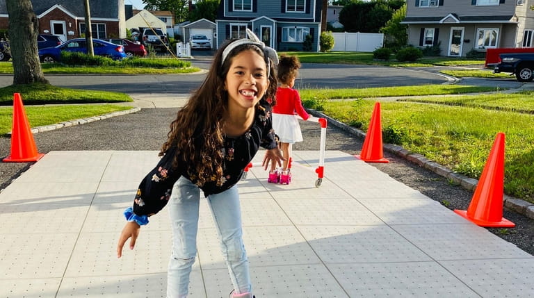 Kaylee JeanBaptiste, 7, tries out the United Skates of America...