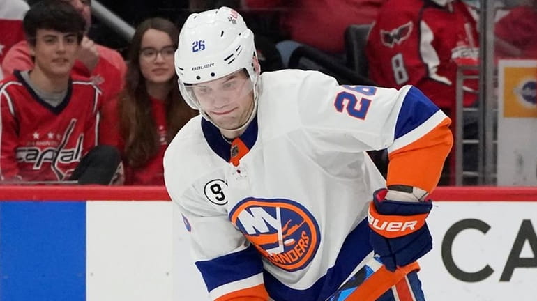 Islanders right wing Oliver Wahlstrom skates with the puck against Capitals...